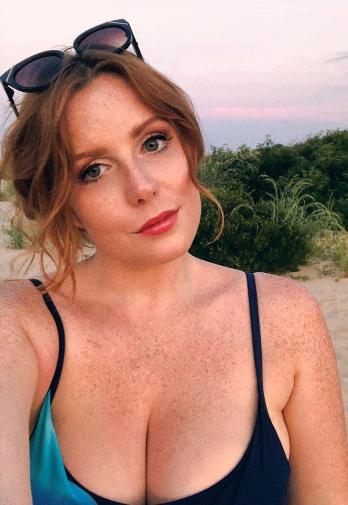 REDhead MILF "Emily": we don't know much about this busty redhead MILF, but we like her.